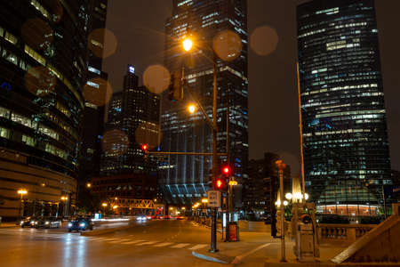 Chciago by night during rain on Franklin Street.の写真素材