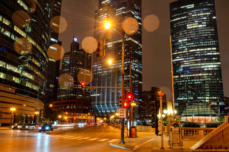 Chciago by night during rain on Franklin Street.の写真素材