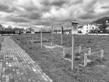 Outdoor gymnastics gear in a city park.の写真素材
