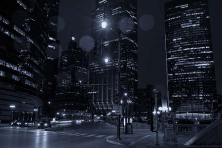 Chciago by night during rain on Franklin Street.の写真素材