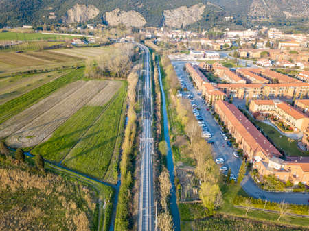 Aerial view from the drone of the railway that runs along a small town in Tuscany.の写真素材