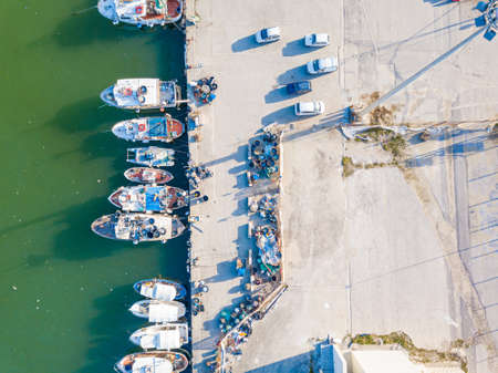 Aerial view of the port with small fishing boats at the evening.の写真素材