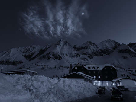Beautiful night view of a tipical hotel at Passo del Tonale, Italy.の写真素材