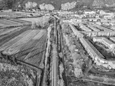 Aerial view from the drone of the railway that runs along a small town in Tuscany.の写真素材