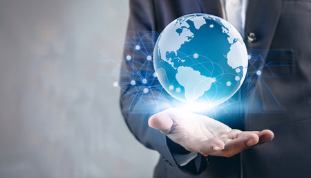 Close up of businesswoman hand holding glowing earth globe. 3D renderingの素材