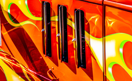 Beautiful close up photo of the engine vents on the side of the flip-up engine cover on a classic...