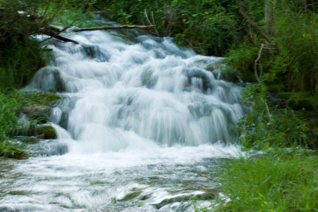waterfall in the forest, photo as a background, digital imageの写真素材