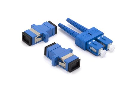 Three optical connectors isolated on whiteの写真素材