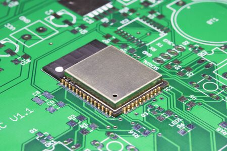 Unsoldered integrated circuit on the green PCB