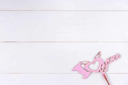 Love sign on white wooden backgroundの写真素材