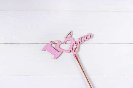 Love sign on white wooden backgroundの写真素材