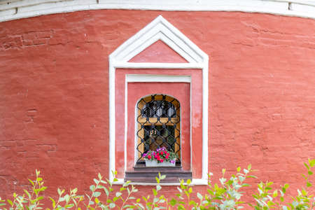 Window of orthodox church in the ancient townの写真素材