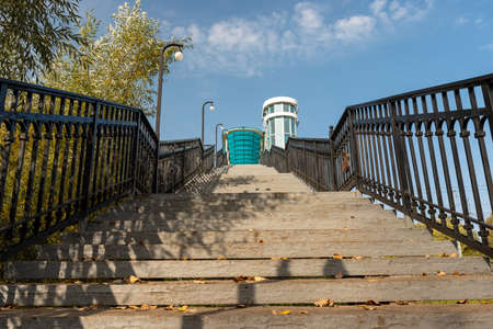 Empty outdoor staircase at city train platform station