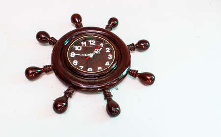 Wall clocks that are on a white background wooden frame の写真素材