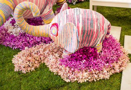 BANGKOK, THAILAND-JUNE6: Kinnaree decorated model of a variety of orchids. spicies in the event of 7th Siam Paragon Bangkok Royal Orchid Paradise on June 6, 2013 in Bangkok Thailand.のeditorial素材
