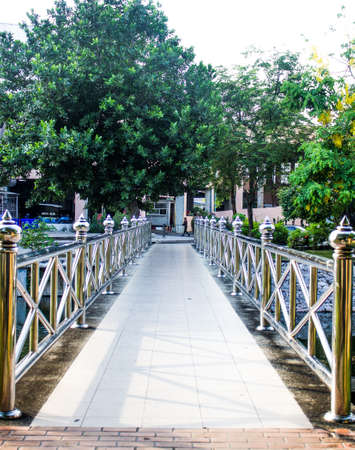 The bridge is a footpath running across the river のeditorial素材