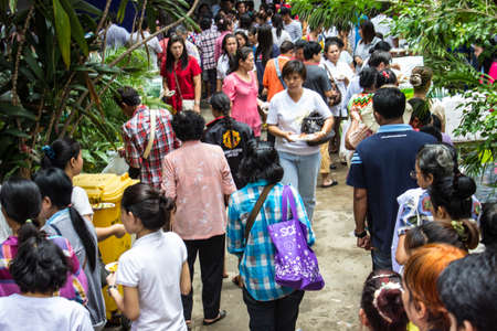 SINGBURI, THAILAND-AUGUST 15  Unidentified People come to the temple and attend  birthday on the...
