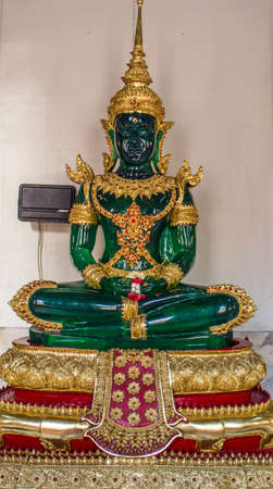 Beautiful green Buddha in the temple, Thailand のeditorial素材