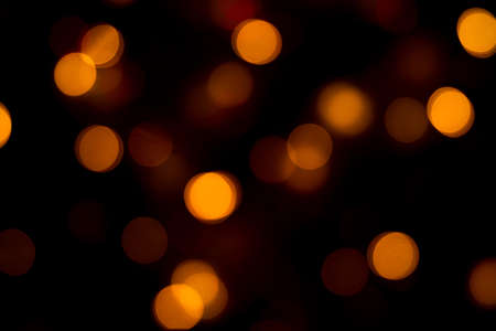 Festive background with blurred circles of different colors.