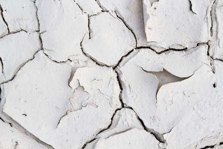 Land with dry, cracked earth. without lifeの写真素材