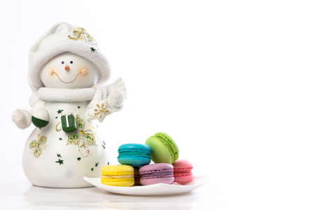 collection of brightly colored French macarons on white backgroundの写真素材