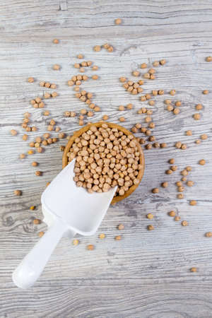 Walnut chickpeas in a bamboo bowl with white juiceの写真素材
