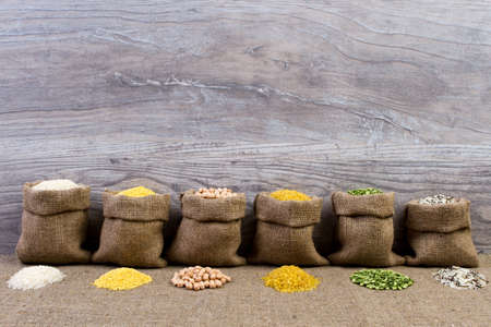 Set groats, peas, rice, millet, peas in sacks, burlapの写真素材