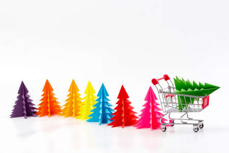 Christmas tree assorted colors of paper isolated on whiteの写真素材