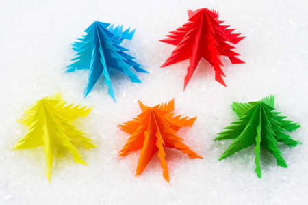 Christmas tree lying in a shopping cart, isolated backgroundの写真素材