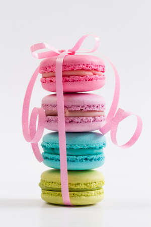 Sweet and colourful french macaroons or macaroons on white background, Dessert.の写真素材
