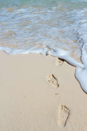 beach, wave and footstepsの写真素材