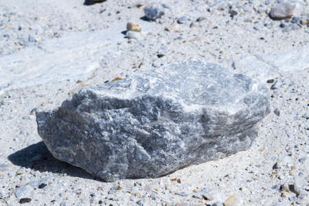 Placer of large stones in a stone quarry close-up. Mining industry.