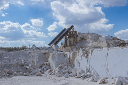 Granite quarry. Working mining machines. Mining industry.の写真素材