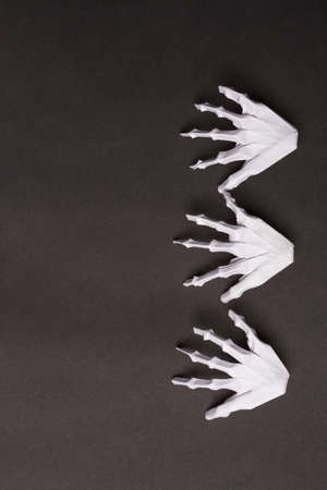 Black Halloween Background with White Skeleton Hands