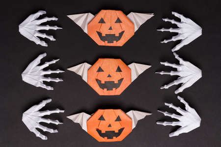 Black Halloween Background with White Skeleton Hands