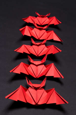 Halloween Background. Black background. Red and black bats