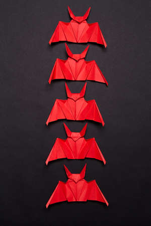 Halloween Background. Black background. Red and black bats