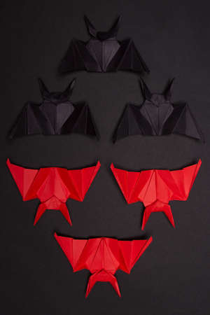 Halloween Background. Black background. Red and black bats