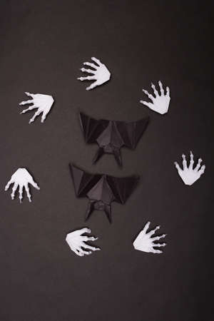 Black Halloween Background with White Skeleton Handsの写真素材