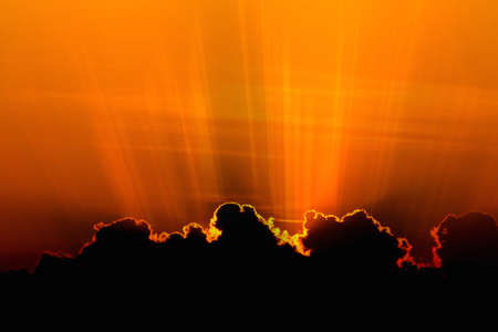 Beautiful sunset over sea with reflection in water, colorful clouds in the sky. backgroundの写真素材