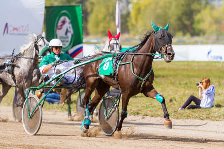 Russia, Novosibirsk, September 5, 2015: Horse racing at the racetrack. City competitionsのeditorial素材