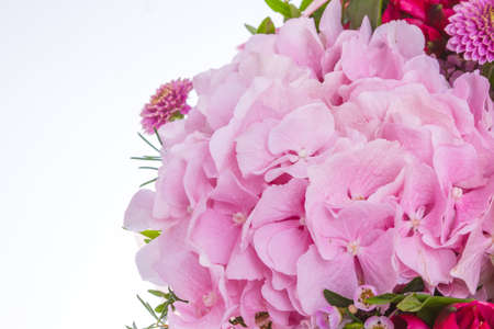 Bright buketny composition from fresh flowers, the white backgroundの写真素材