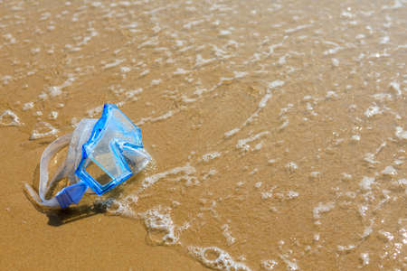 The swimming mask on the sandy beach. Scuba diving.の写真素材