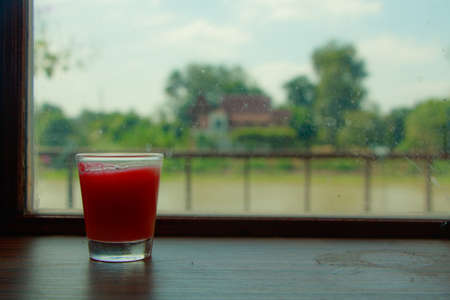 Red Fragrance Candles of various colors by blur background.の写真素材