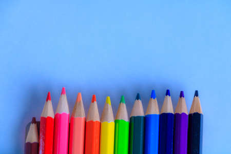 Wooden colorful pencils on white table.の写真素材