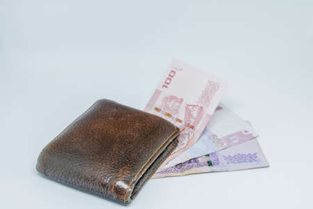 Old wallet on white background.の写真素材