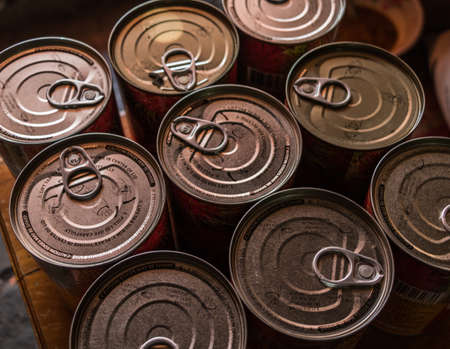 Canned fruit is placed on table.の写真素材
