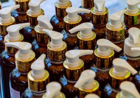 Array of Shampoo bottle on the table.の写真素材