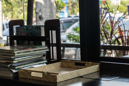 Book stack on a table in coofee shop.