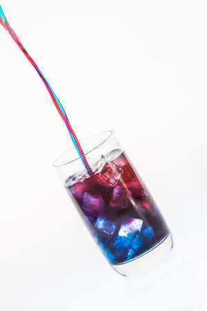 Colorful blended drink being mixedの写真素材